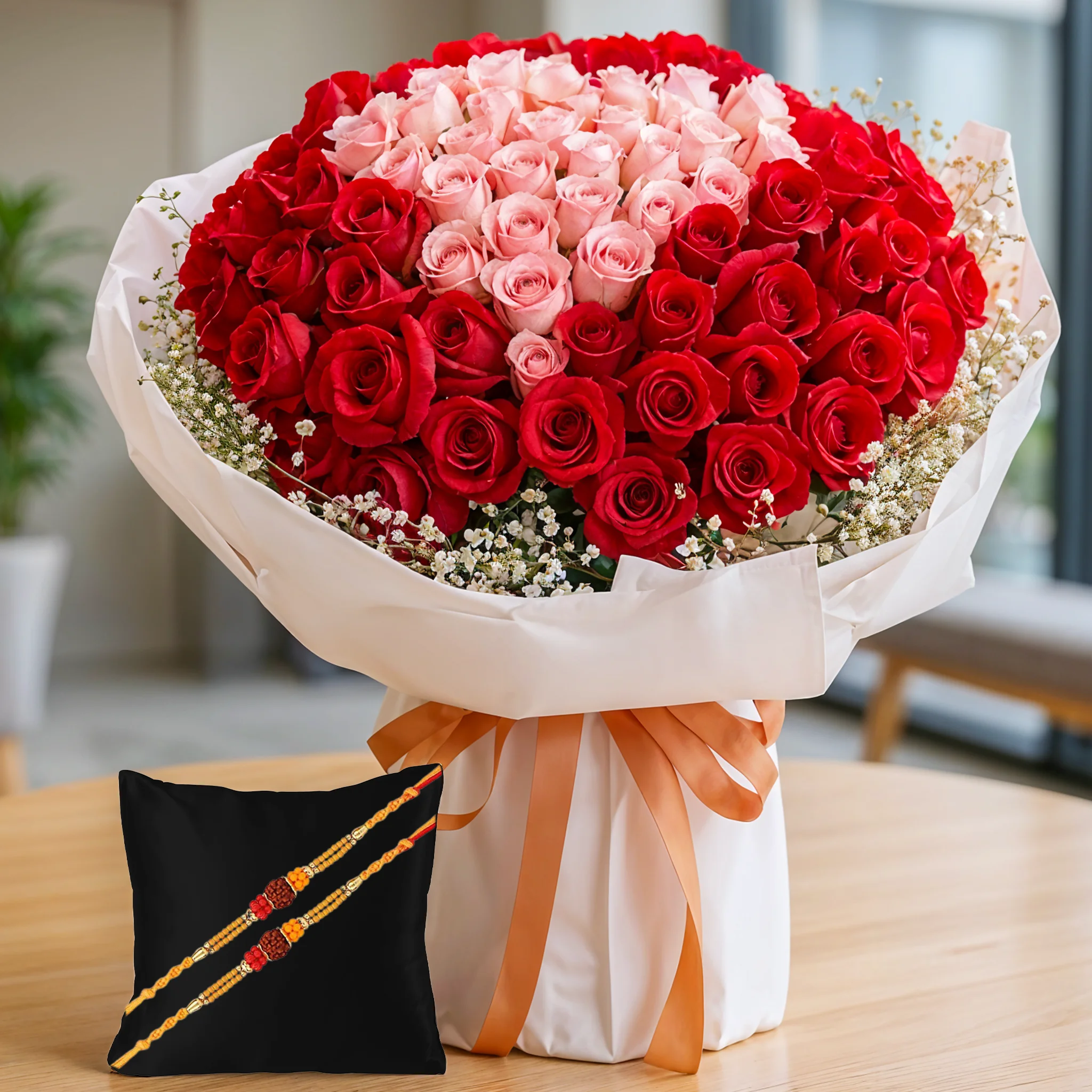 Bouquet of 100 Roses with 2 Rakhis