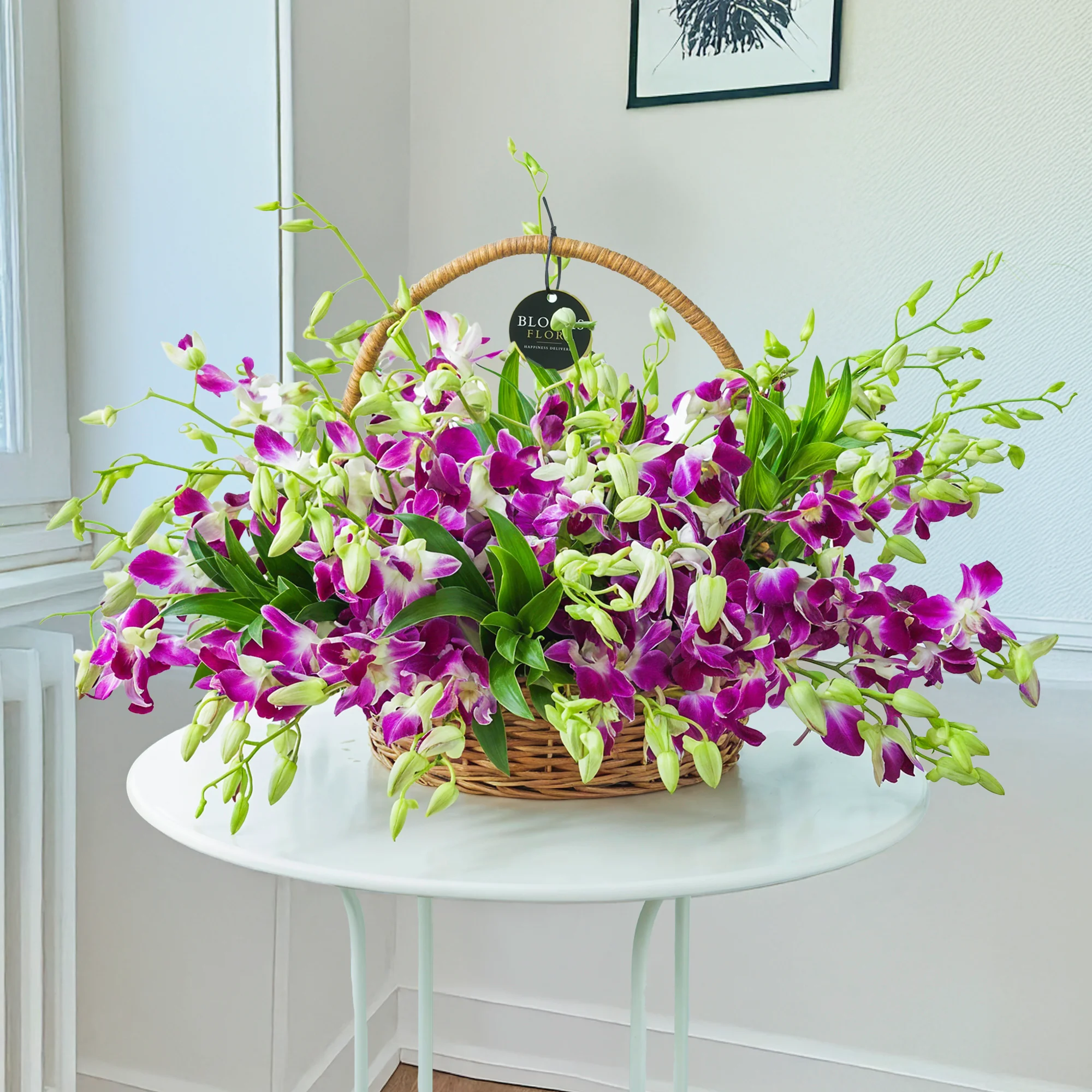 75 purple orchids with green fillers in a handle basket.