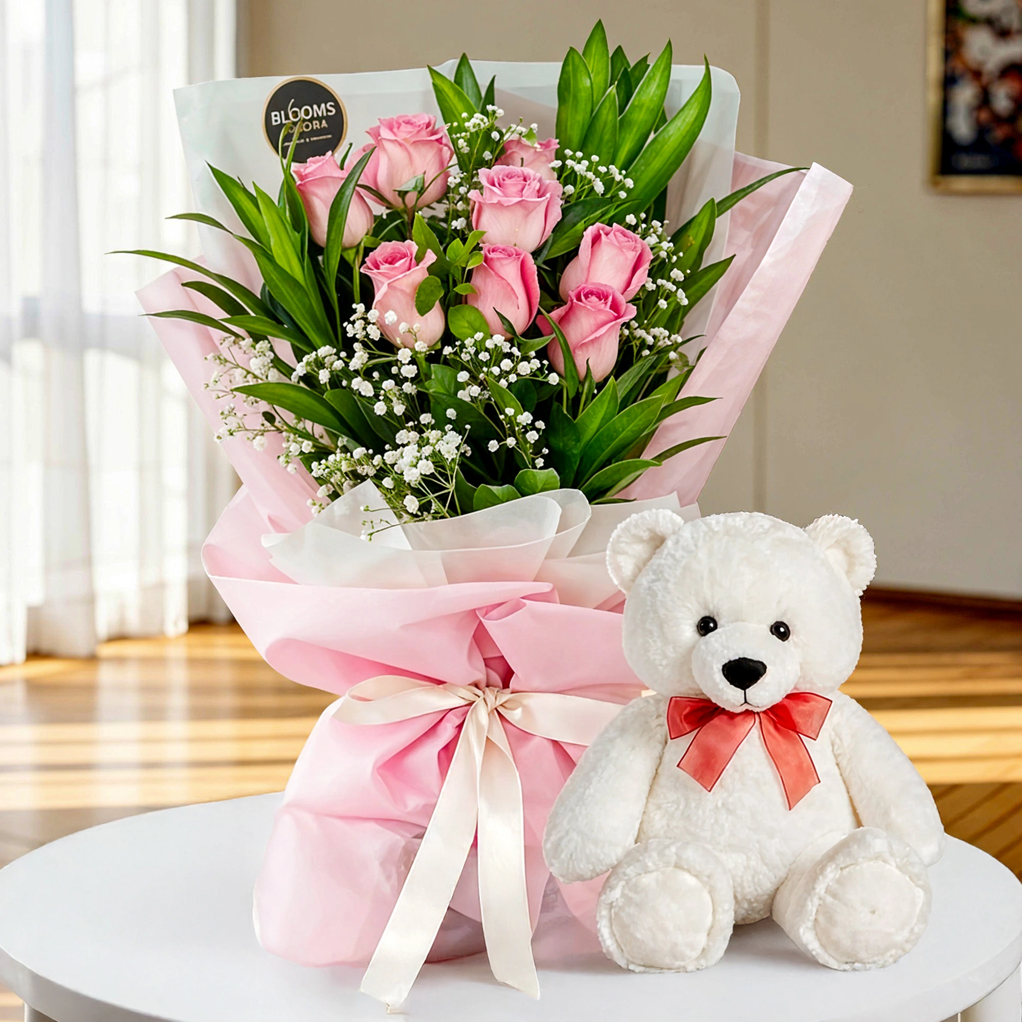 8 pink roses bouquet with 6 inche white teddy bear