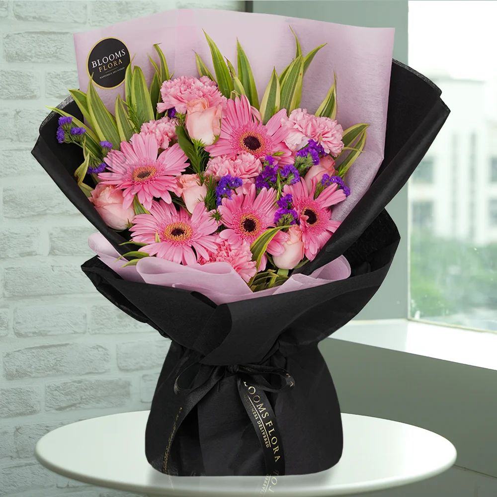 5 pink roses, 5 pink carnations, and 5 pink gerberas bouquet