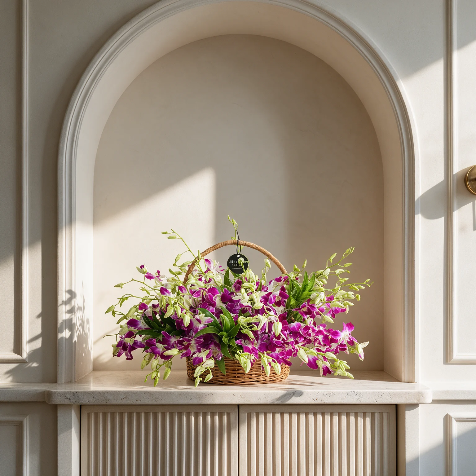 75 purple orchids with green fillers in a handle basket.