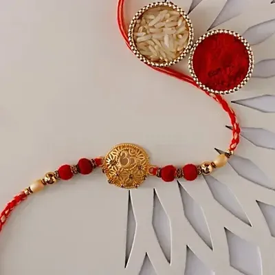 Golden Om Rakhi